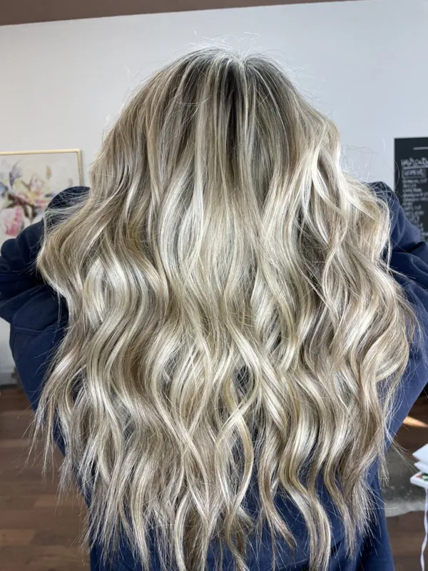 Long dimensional blonde waves by Halo Salon in Crystal Springs, MS